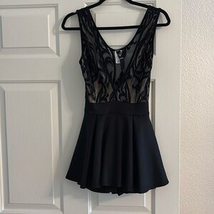 Size medium dress/romper- has shorts